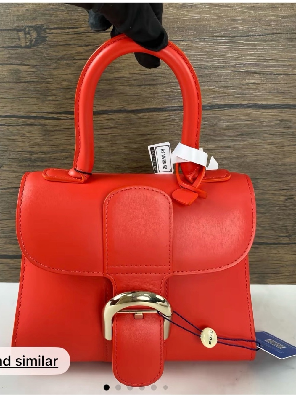 Elegant Delvaux Top Handle Bag in Bright Red Leather